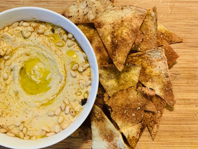 homemade hummus with toasted pita chips
