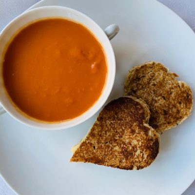 tomato soup with heart shaped grilled cheese
