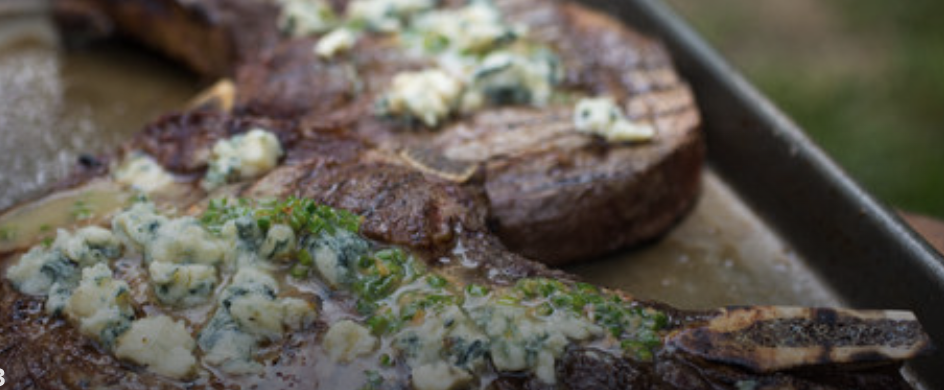 grilled rib eye steak with chive butter